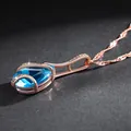 Exquisite vintage rose gold necklace featuring a teardrop aquamarine blue zircon pendant - Rose Gold White Zirconia / Rose Gold