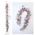 Detailed view of 180cm pink Christmas garland with poinsettias, baubles and snowy pine - Christmas Garland (T675) / 180cm / Pink