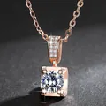 Detailed close-up of a rose gold pendant featuring a brilliant round cubic zirconia stone. - With Chain / Rose Gold