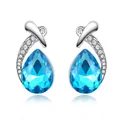 Exquisite silver-toned stud earrings featuring vibrant blue teardrop crystals and accents - Aquamarine