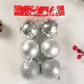 Detailed view of 6 silver Christmas baubles in packaging with shiny, matte, and glitter finishes. - 3cm (Pack of 12) / Silver