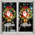 Festive Christmas window stickers featuring Santa Claus and reindeer on a glass pane - Style XD-303 (006SDJDT23)