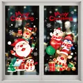 Large colorful Christmas static window clings with Santa and reindeer on a white window. - Style XD-304 (006SDJDT23)
