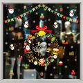 Large festive Christmas window static stickers featuring a wreath, Santa and snowflakes. - Style XD-308 (006SDJDT23)