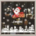 Detail view showing festive Santa Claus and snowflake static window decals on glass - Style XD-319 (006SDJDT23)
