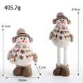 Plüsch-Weihnachtsschneemann Teleskoppuppe mit kariertem Schal und Ohrenschützern - Retractable Doll / Schneemann