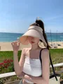 Asian model wearing a beige wide-brimmed UV protection sun hat on a sunny beach - M (56-58cm) / Beige