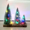 Set of three mini frosted Christmas trees with colorful LED lights on a natural wood base - Triple Tree Set RGB / 10-15-20cm