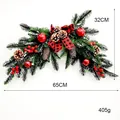 Detailed view of a 65cm Christmas ox-horn wreath with pine cones and red berries - 65cm Horn Swag (PE Christmas Wreath) / 1 Piece