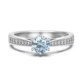 Elegant S925 sterling silver ring with central round cut stone and side accents - Size 5 / White Gold (March/Light Blue Stone)