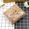 Golden glitter shredded raffia paper filler for gift boxes and gift wrapping - Champagne Glitter Silk (PT09) / 50g Weight / Champagne