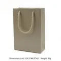 Champagnerfarbene Papiertragetasche mit Kordelgriffen, Größe 14,5x6,5x21cm, 30g. - Papier-Handtaschen / 14.5x6.5x21cm / Champagner