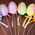 Close-up detail of glittery floral foam Easter egg picks with ribbons for festive decor - Macaron Print (038)