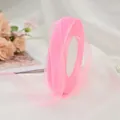 Close-up of pink sheer chiffon ribbon roll for gift wrapping and cake decoration - 450m/Roll (0.6-0.7cm Wide) / Pink