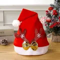 Festive red Christmas hat featuring glitter antlers and a shiny metallic gold bow decoration - Red Reindeer Antlers