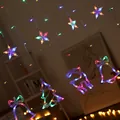 Detail view of colorful LED star and reindeer shapes on decorative curtain lights - Christmas Curtain Light (Flush) / Plug-in 220V (Standard Controller) / Colorful