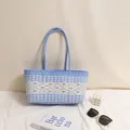 Handmade blue and white woven plastic tote bag with diamond pattern for beach vacation - Blue