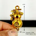 Pendentif gourde dorée galvanisée avec caractère 福 et spécifications - Calebasse de Fleur