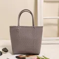 Elegant taupe plastic woven tote bag perfect for beach vacations and summer shopping trips - S / Gray