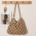 Elegant hand-woven hollowed cotton rope beach shoulder bag in a natural beige colorway - Coffee (With Lining)