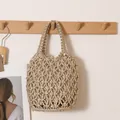 Elegant gold metallic thread woven bucket bag hanging on a wooden wall hook for vacation - With Liner / Gold