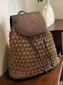 Elegant hand-woven straw backpack with dark brown faux leather flap and drawstring - Backpack Leather Flap Style / Brown