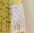 Detailed macro view of cream handmade macrame crossbody bag with long fringes and tassels - Shoulder Crossbody (Water Ripple) / Beige