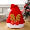 Red Christmas Santa hat featuring plush reindeer antlers and a red polka-dot bow - Coffee Antler Style