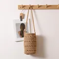 Bolso de cubo de cuerda de algodón tejido beige con un elegante diseño calado para vacaciones - Cubo Calado de Algodón / Café