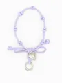 Detailed view of lavender braided phone lanyard with bow knot and silver heart charm - Purple