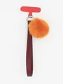Detailed view of dark red PU leather strap with bright orange fluffy pom-pom keychain - Dark Red