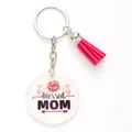 Close-up of acrylic keychain featuring 'Blessed Mom' typography and a vibrant pink tassel - Blessed Mom Rose