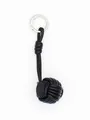 Close-up of black PU leather hand-woven ball bag charm with silver clasp - Black (22344-1)