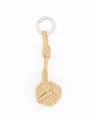 Close-up of handmade woven leather ball bag charm in beige with silver metal ring - Light Khaki (22343-1)