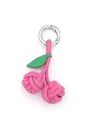 Macro view of a handcrafted pink woven PU leather cherry-shaped keychain with green leaf - Hot Pink