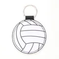 Macro detail of a circular white volleyball leather keychain with precise black stitching - Volleyball