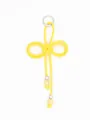 Detailed view of a handmade yellow braided PU cord pendant accessory with silver beads - Lemon Yellow
