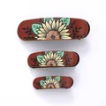 Retro sunflower pattern hair clip set with three different sizes on white background. - Retro Sunflower Style (90292)