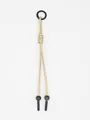 Detailed view of a handmade woven PU leather cord keychain with decorative beads and ring - Beige