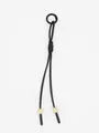 Detailed view of hand-braided black PU leather cord pendant with cream beads and ring. - Black