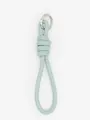 Detailed close-up of a light blue PU leather braided keychain with a silver metal ring - Mint Green