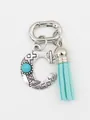 Southwestern style letter C bag charm with turquoise stone and blue tassel detail - Letter C