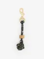 Macro detail of a handmade braided knot keychain with wooden bead and gold metal clasp - Pink Green Floral (22599)