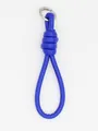 Close-up of bright blue PU leather braided hand strap with silver metal ring - Sapphire Blue