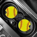 Vibrant yellow softball pattern car coasters set displayed in a car's cup holder. - Yellow Softball (80104) / Two-Piece Set