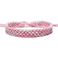 Macro view showing the intricate weave of a pink and white handmade braided wax rope bracelet - Pink and White (30268)