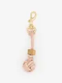 Close-up of handmade pink braided ball keychain with wooden bead and gold clasp - Pink Leather Cord (22598)