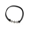 Close-up view of black woven waxed cord bracelet featuring three silver cross charms on white. - Black Cross Pendant (30242)