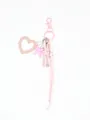 Detailed view of a pink heart-shaped leather mirror charm with bow and braided cords - Peach Pink(22171)