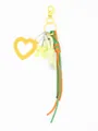 Detail view of leather heart mirror keychain with colorful braided rope and bow charm - Yellow(22175)